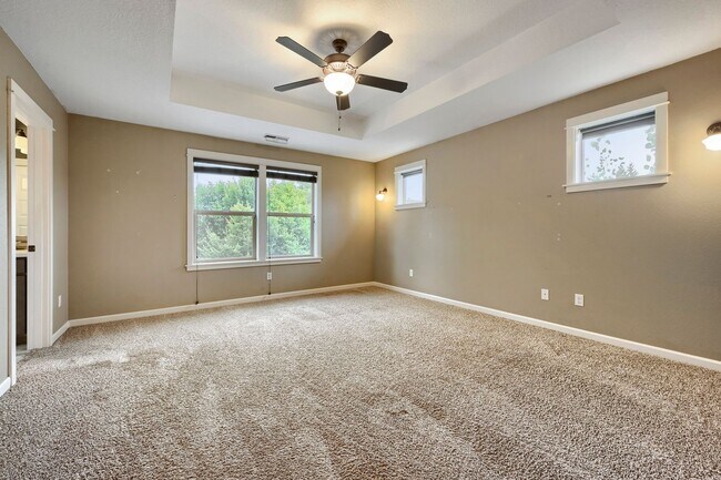 Building Photo - Custom-Built 4BR/2.5BA Two-Story Near Woodstock — Quartz Island Kitchen, Gas Fireplace & Fenced Y...
