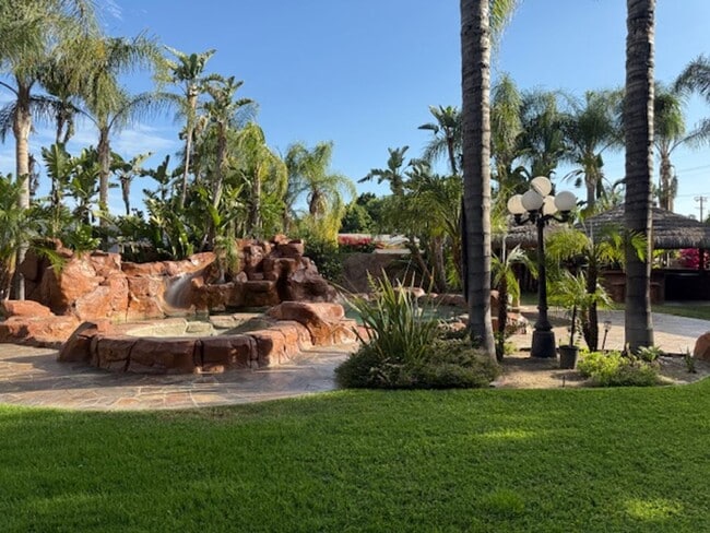 Building Photo - Gated estate with a backyard oasis