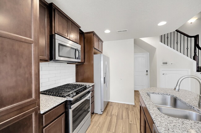 Building Photo - $1,849.00 - 3 Bed, 2.5 Bath Townhome in CO Springs with AC and In Unit Laundry!