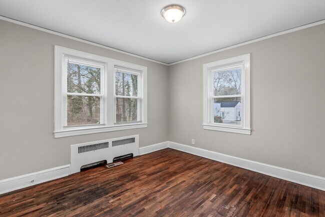 Building Photo - SW, Large Brick Two Bedroom PLUS Two Sun-Rooms, Hardwoods, LR & Separate DR, Fire Place!