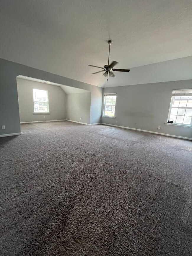 Building Photo - Spacious 4-Bedroom Pet Friendly Home with a Serene View - Available for Rent!
