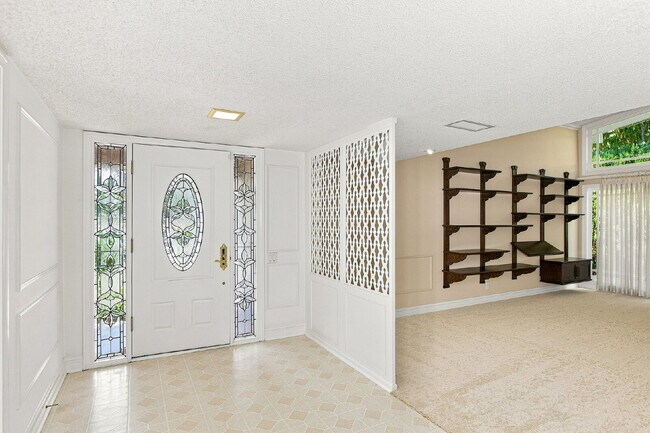 Building Photo - Coveted and Spacious Rossmoor 3-bed/2-bath Home with Expansive Entertainer’s Backyard