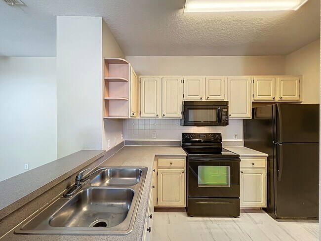 Building Photo - Renovated 2 Bed / 2 Bath Condo in Gated Visconti Condominiums – Maitland