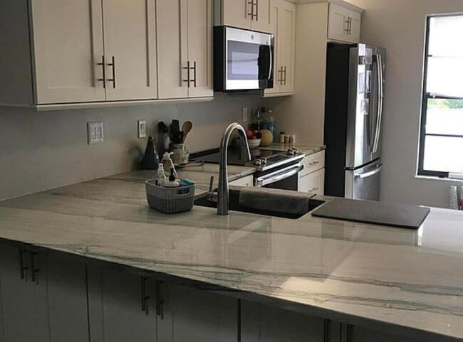 Building Photo - 7716 SE Sugar Sand Cir