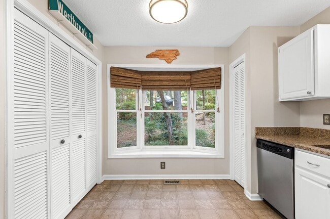 Building Photo - Spacious 4-Bedroom Carrboro Home with Dual Primary Suites & Community Amenities
