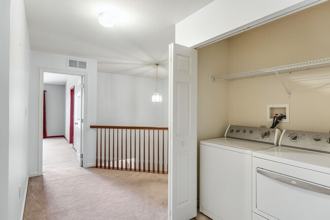 Building Photo - Three bedroom two and a half bathroom town...