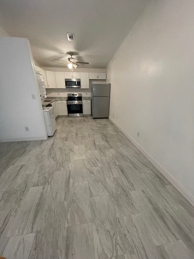 Building Photo - 6831 Tiki Ln