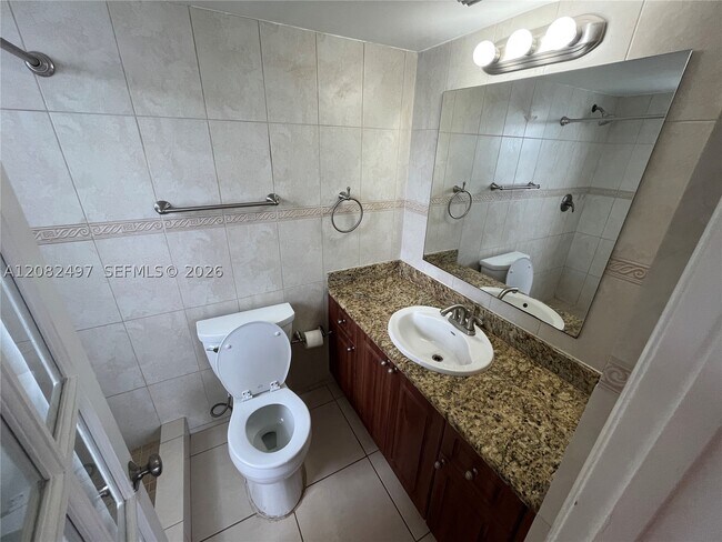 Building Photo - 8560 N Sherman Cir