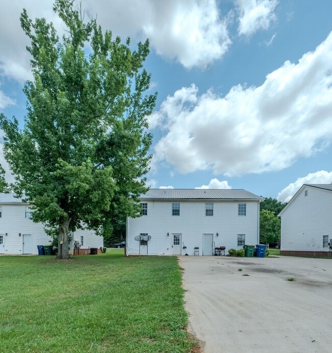Building Photo - Spacious 4BR/3BA Townhome | Pet Friendly | Washer & Dryer Included | $1,600/mo