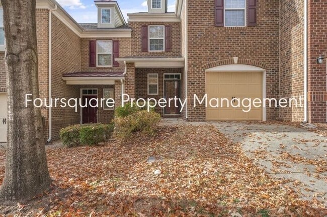 Building Photo - Charming Townhome with Open Layout, Back Patio & One-Car Garage – Near RTP, RDU & Everyday Conven...