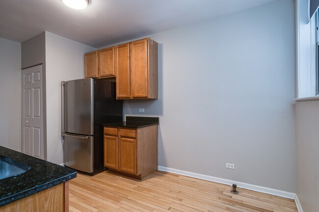 Kitchen with SS Refrigerator - 603 Washington Blvd