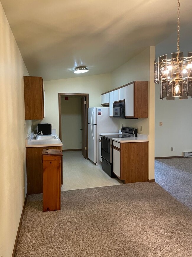 Building Photo - Spacious 2-Bed, 2-Bath Condo with Comfort and Convenience!