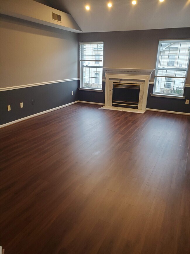 Main room with new flooring - 5921 Founders Crossing Ct