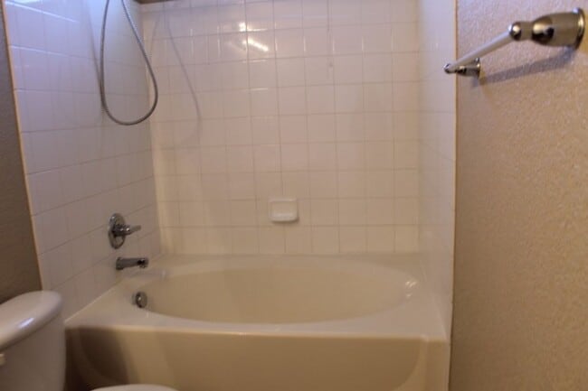 Building Photo - $1742 | 2BR/2BA | Lovely Townhome with a P...