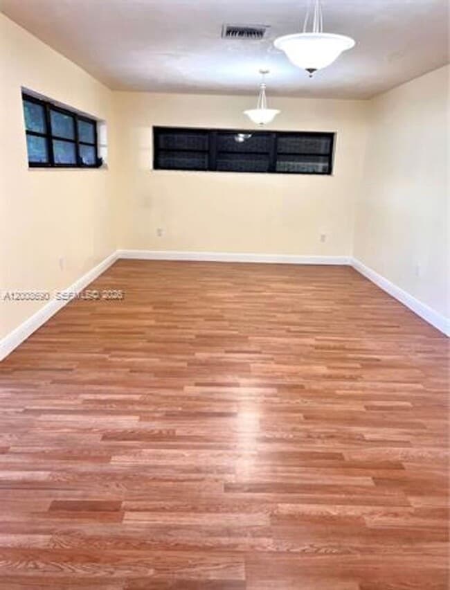 Building Photo - 10881 N Snapper Creek Dr