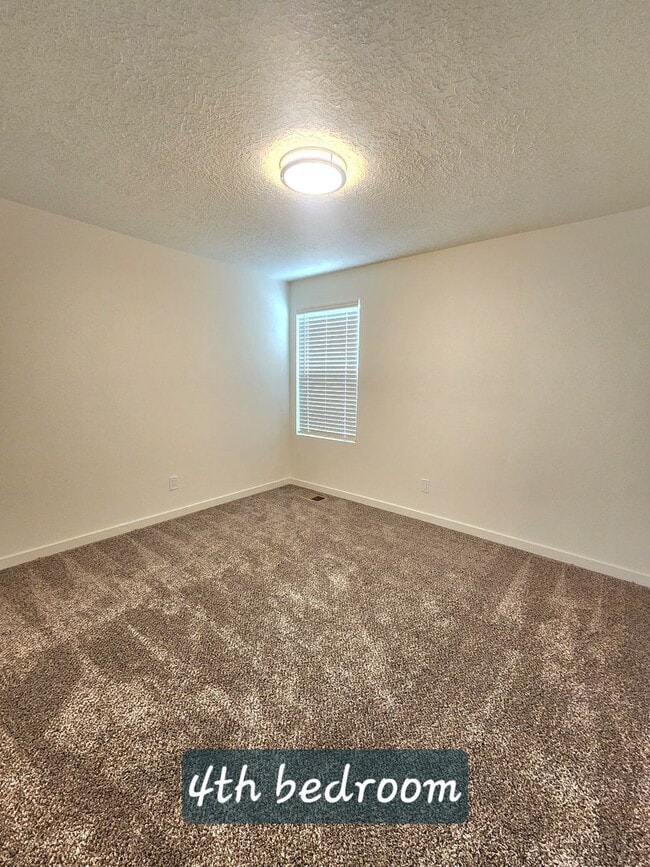 Building Photo - Brand-New Construction Townhome – Never Li...