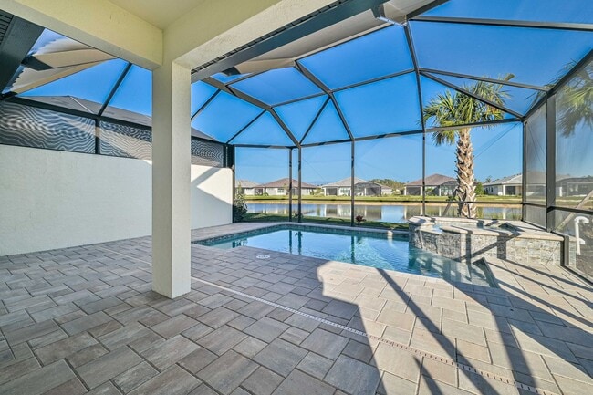 Building Photo - **Coach Home w/ Private Pool in Esplanade Lake Club **