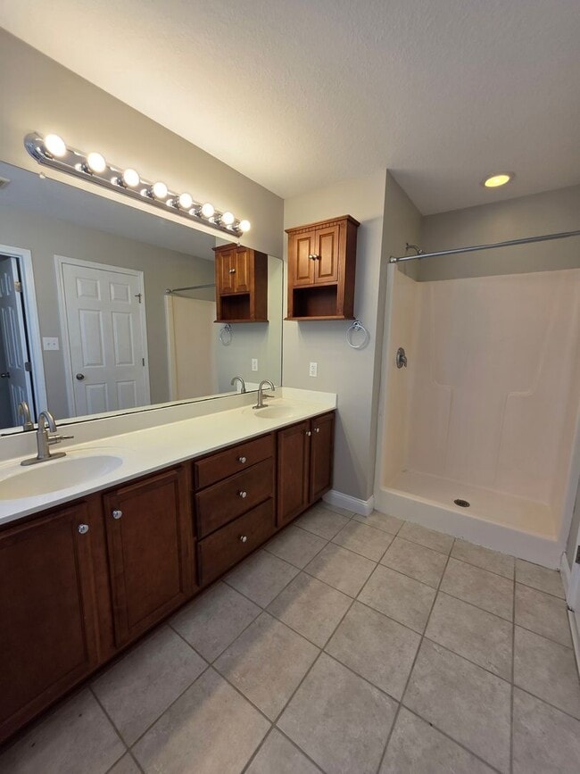 Building Photo - Spacious 4-Bedroom Bryan Farms Beauty with Bonus Suite, Large Fenced Yard & RV/Boat Parking!