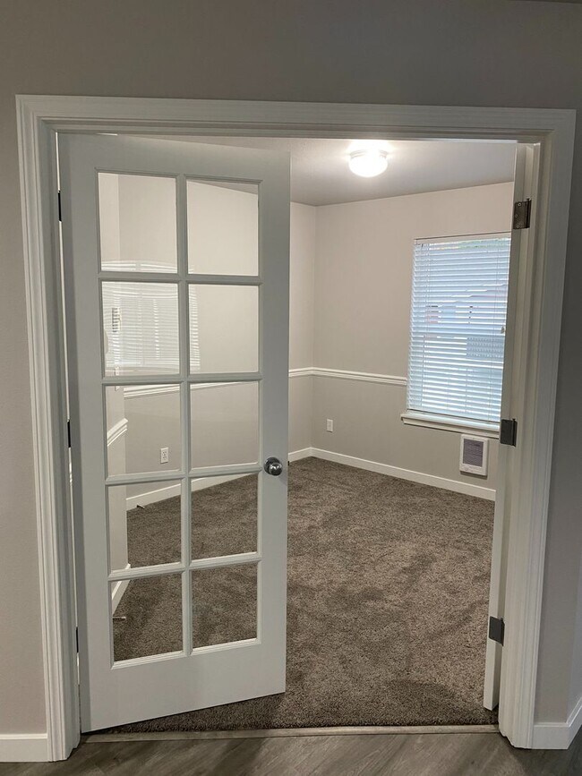 Building Photo - 2 Bedroom with a Den, 1-car oversized detached garage, DuPont Condo