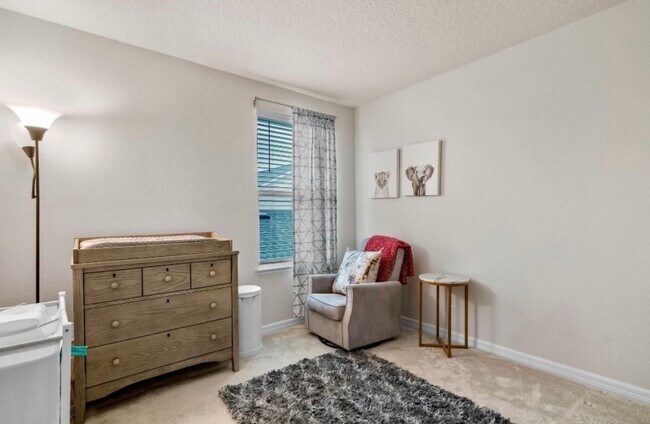 Building Photo - Water Front Home- 4 Large Bedrooms-3 baths Gated Community Call Sheila Campbell 407-687-7900