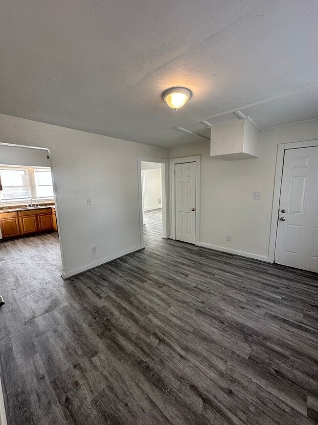 Building Photo - Three Bedroom Available Soon!