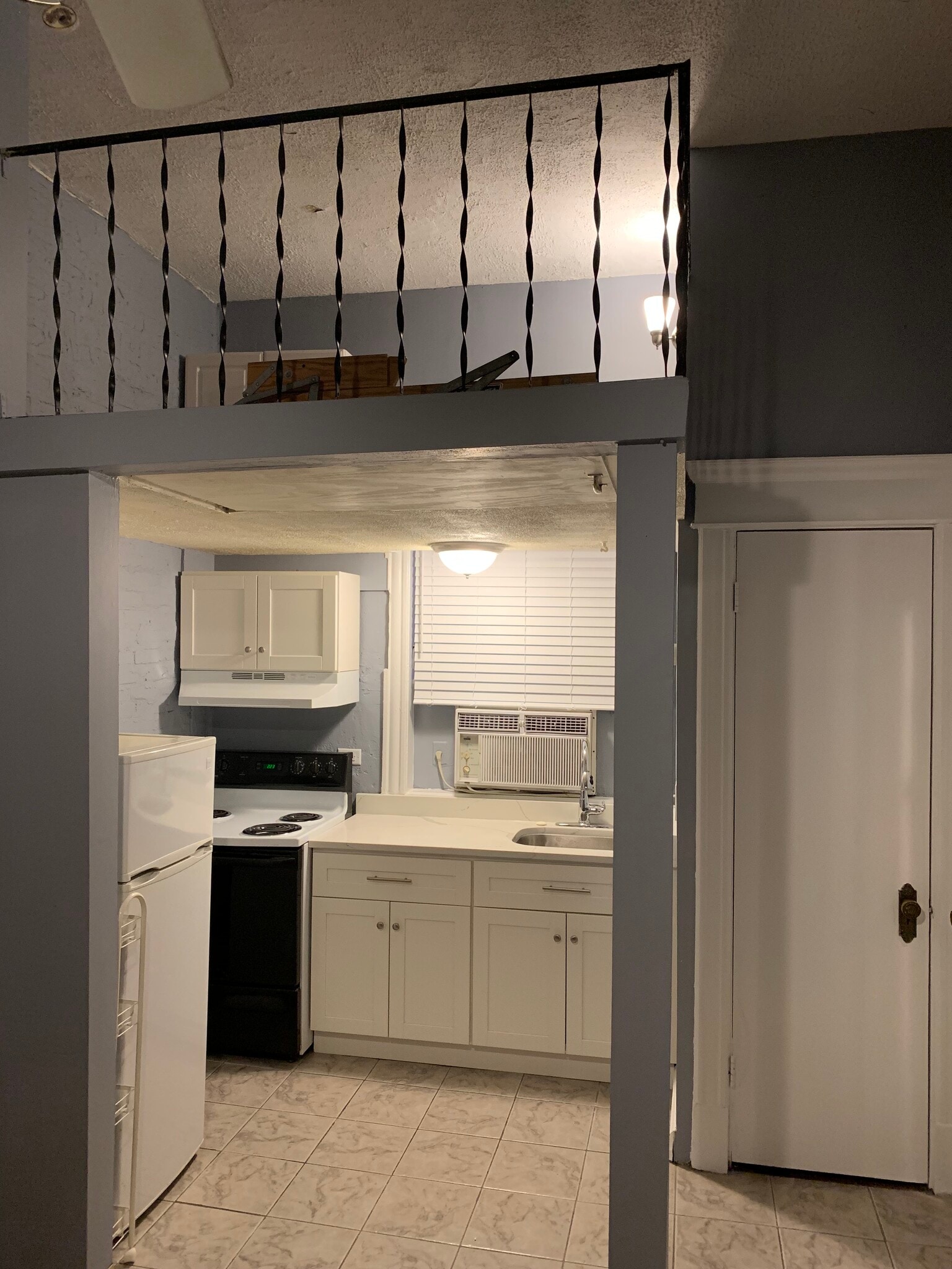 Kitchen - new cabinets and quartz countertop - 2800 N Pine Grove Ave