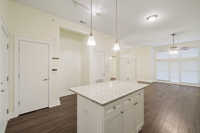 Building Photo - COMING SOON! Modern 1BR/1BA in First Ward – Walk to Parks, Dining & Entertainment