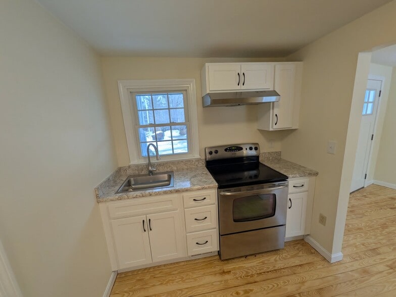 Kitchen open plan to living space - 217 Bigelow Hill Rd