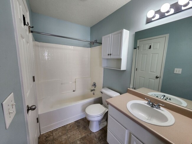 Building Photo - PRICE DROP! 3 bdrm 1.5 bath townhome! You'll love our giant DECK!