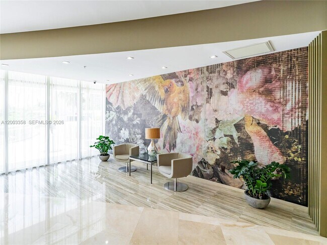 Building Photo - 10275 Collins Ave