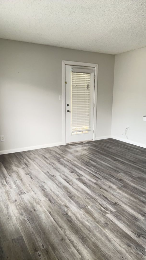 Building Photo - For Rent: 1 Bedroom, 1 Bath in a gated com...