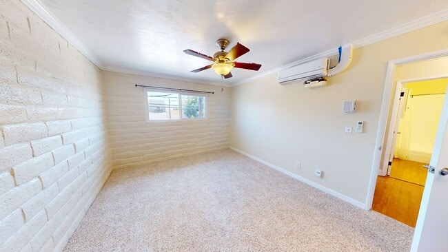 Building Photo - Freshly Painted Upstairs Condo with Community Pool