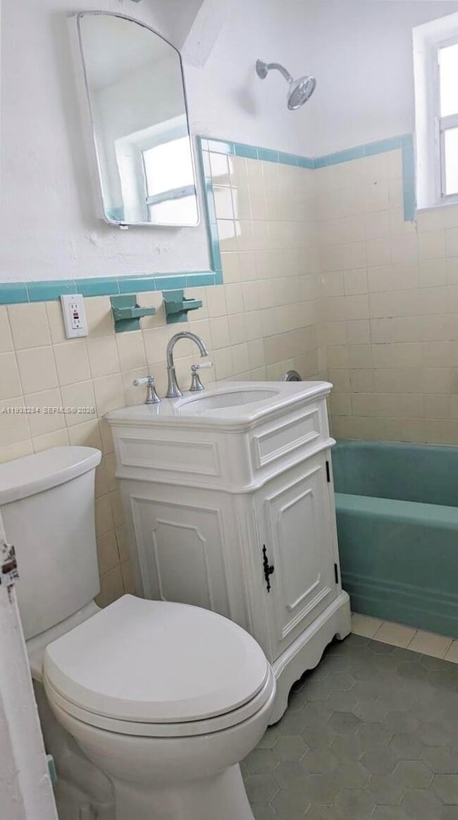 Building Photo - 7445 Harding Ave