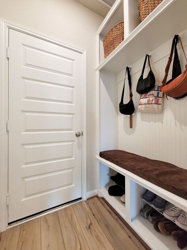 Building Photo - A true gem on a quiet corner lot, this spacious and sun-filled home is tucked away from street no...