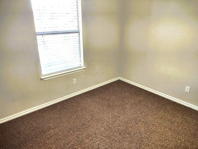 Building Photo - Dazzling Two Story Westside Home With Refrigerated Air Located In Quiet Neighborhood