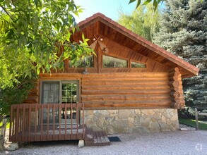 Building Photo - ONE ROOM | 1 BATH | LOG COUNTRY COTTAGE IN...