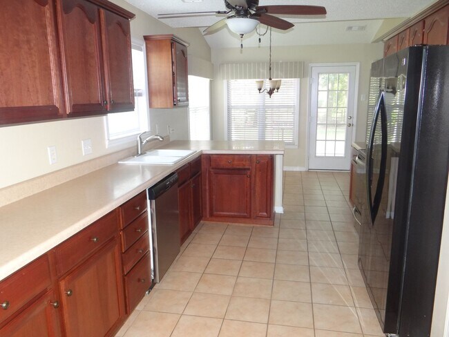 Building Photo - Lovely 3 bedroom 2 bath home in 55 and older neighborhood with 2 car garage