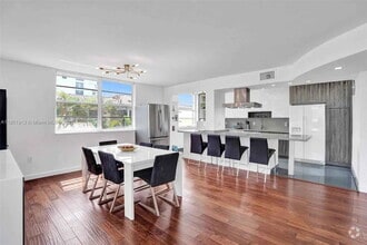 Building Photo - 9180 W Bay Harbor Dr