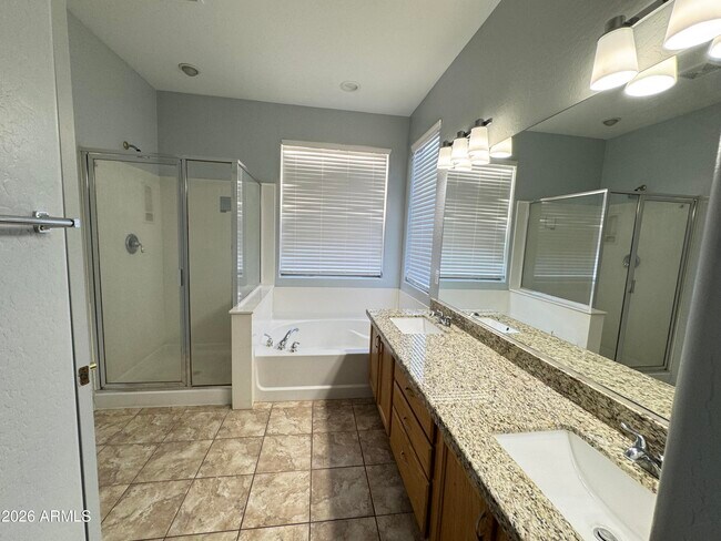 Building Photo - 11562 W La Reata Ave