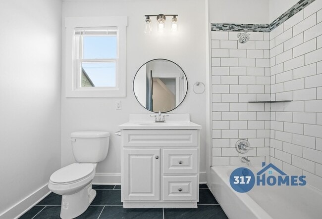 Building Photo - Spacious Four Bedroom Townhome with Main Level Suite in Holy Cross