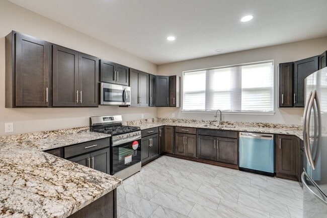 Building Photo - Brand-New 3-Bed, 2.5-Bath Condo: Modern Co...