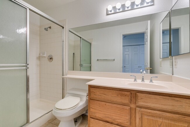 Building Photo - Charming Second-Floor Condo with Two Bedrooms and Fireplace