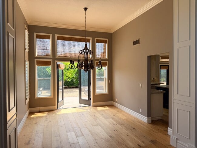 Building Photo - Elegant Mediterranean Living with Private Pergola Garden & Resort Amenities