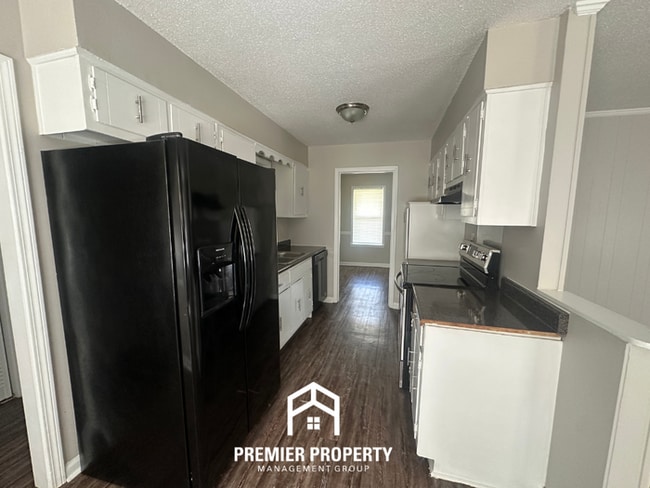 Building Photo - Beautiful 3BR/2BA Bartlett Cove | 1,668 Sq Ft, Brick Fireplace & Dual Dining Areas