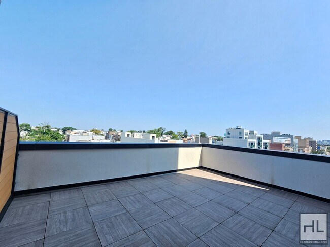 Building Photo - Spacious Studio with Balcony in Modern Bui...