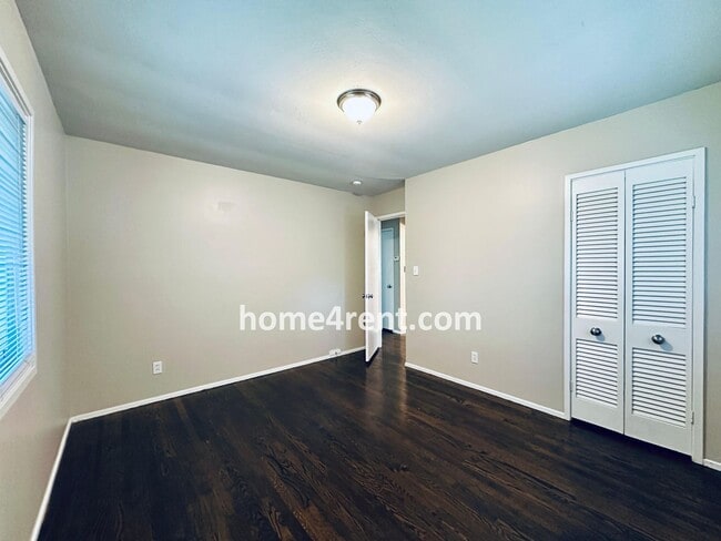 Building Photo - Attractive Prairie Village Ranch w/ FRESH PAINT, Wood Floors, Granite Counters and a Fenced Yard!