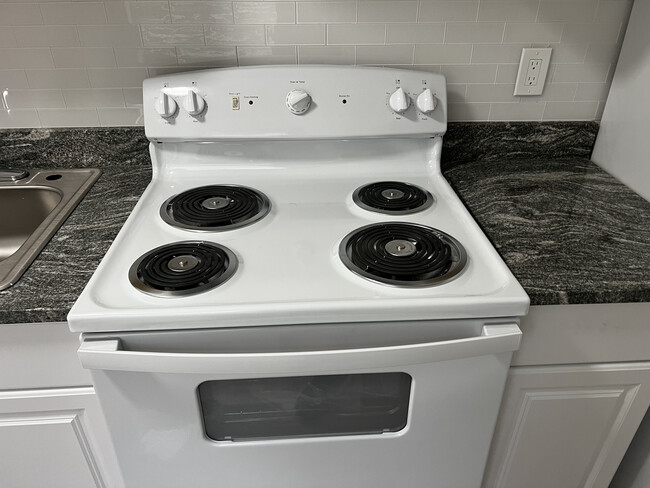 new stove - 101 NW 13th Ave