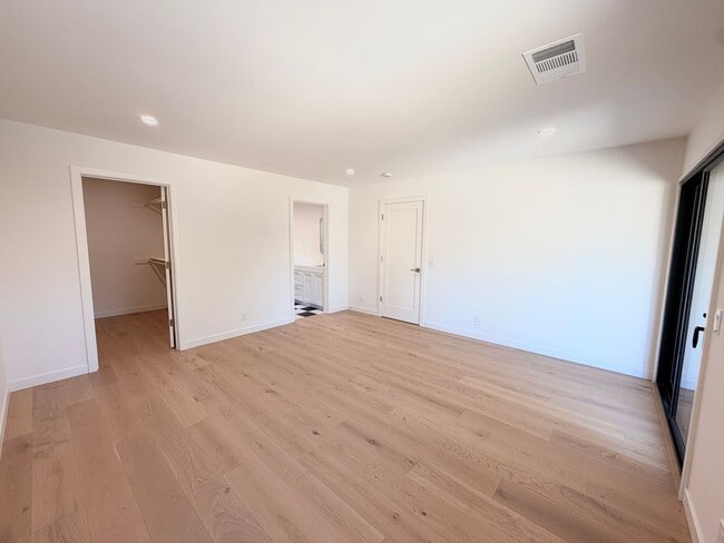 Building Photo - This premier 4-bed, 3-bath estate spans 2,565 sq. ft. on a 10,253 sq. ft. lot in North Los Altos.