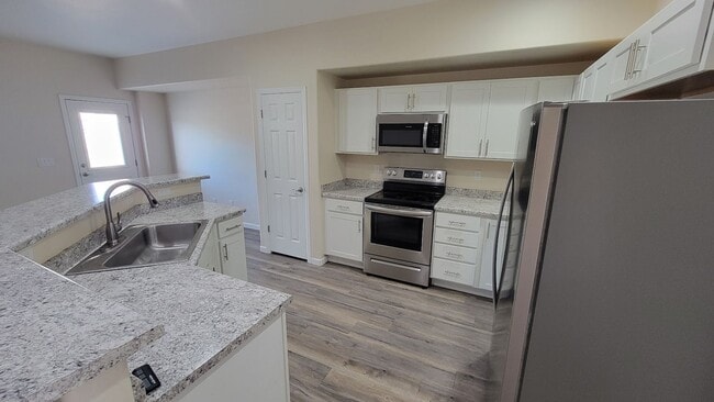 Building Photo - Modern 2020 3-Bedroom 2-Story Townhome Near Mesa Mall