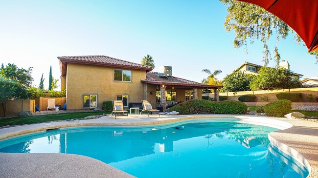 Building Photo - Heated Pool Home/Split Level Magic Zip Code